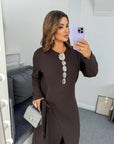 Midi dress with a slit made from polyester and viscose, with an elegant design and cut-out part for stylish appearance.