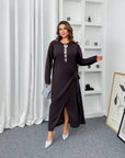 Midi dress with a slit made from polyester and viscose, image of elegant women's dress with slit in the photo.