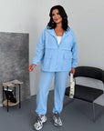 Windbreaker-fabric set made from polyester, image of comfortable and stylish sporty set for everyday use.