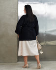 Short fluffy cardigan with belt