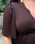 Satin blouse with lace, polyester and viscose, with elastane, elegant women's garment in the image.