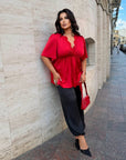 Satin blouse with lace, polyester, viscose and elastane, shown in the image with delicate details and smooth texture