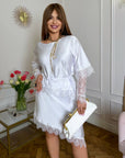 Asymmetrical lace blouse , риза от polyester и viscose, с elastane, показана на изображението.