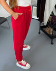 Knit joggers from the NewYear25 brand, cotton, polyester and elastane, with comfortable design and practical style.