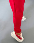 Knit joggers NewYear25 with embroidery and elastane, suitable for comfort and style.