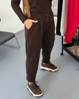Knit joggers NewYear25 with cotton, polyester and elastane, comfortable and stylish for everyday use.