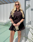 Set aus Bluse und Minirock