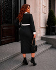 Fitted dress with a statement collar, made from polyester, viscose and spandex, shown on a model.
