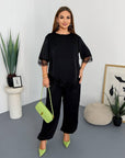 Satin set with lace, soft polyester, elegant design for comfort and style.