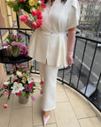 Conjunto con blusa peplum