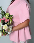 Conjunto falda y blusa con peplum