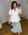 Conjunto falda y blusa con peplum