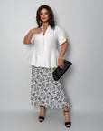 Conjunto falda y blusa con peplum