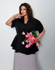 Conjunto falda y blusa con peplum