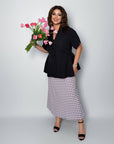 Conjunto falda y blusa con peplum