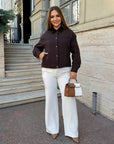 Cropped denim jacket made from cotton and polyester, model from Composition, with long sleeves and a classic design.