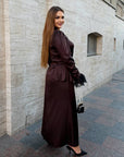 Long dress with a removable peplum belt, polyester, viscose and elastane, model from Composition, image of the elegant garment.