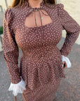 Long dress with a removable peplum belt made from polyester and elastane, image of elegant model.