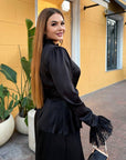 Long dress with a removable peplum belt made from polyester, viscose and elastane, with an elegant design and stylish silhouette.