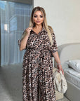 Animal print jumpsuit made of polyester, linen blend, stylish and comfortable for everyday wear.