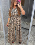 Women’s animal print jumpsuit made of polyester, image of a model showing a stylish and modern design.