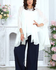 Elegant chiffon dress with a cape, made from viscose and polyester, stylish and light design.