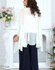 Elegant chiffon dress with a cape, made from viscose and polyester, in gentle colours, suitable for special occasions.
