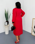 Fitted dress with a statement collar, made from polyester, viscose and spandex, model with an elegant design.