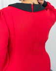 Stylish fitted dress with a statement collar, made from polyester, viscose and spandex, suitable for elegant occasions.
