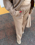 Suede bomber jacket and trouser set, IT brand, polyester, viscose and elastane, in dark shades, shown in the photo.