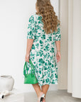 Cotton floral dress  от марка YR, с cotton и polyester, показана на модел с цветен дизайн.