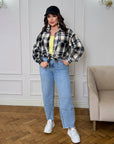 Oversized checked shirt made from cotton and polyester, with roomy, loose fit, in black-white in the photo.