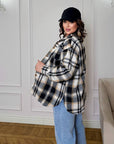Oversized checked shirt made from cotton and polyester, image of shirt with large checks and loose fit.