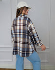 Oversized checked shirt made from cotton and polyester, model with long sleeves and classic cut.
