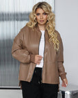 Stylish faux-leather jacket for IT with 100% polyamide, image of a model, showing the details and the cut.
