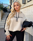 Suede tracksuit IT with polyester, viscose and elastane, shown in an image.