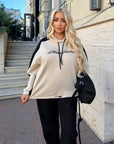 Suede tracksuit IT, composed of polyester, viscose and elastane, shown in the image.
