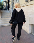 Suede tracksuit made from polyester, viscose and elastane, model IT, shown in the image.