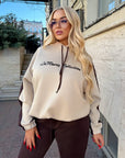 Suede tracksuit with polyester, viscose and elastane, image of fashionable sporty clothing in white.