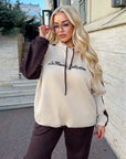 Suede tracksuit from IT, polyester, viscose and elastane, shown on a model in the image.