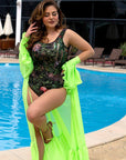One-piece swimsuit от polyester, с ярък дизайн и кройка, подходящ за плаж и плуване.
