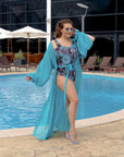 One-piece swimsuit от polyester, модел с ярки цветове и модерна кройка, подходящ за плаж и плуване.