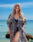 Long printed beach tunic  от viscose и polyester, подходяща за плаж и летни разходки, с ярък дизайн.