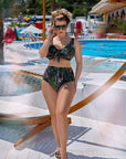 Two-piece swimsuit от polyester, изображение на модел с ярък дизайн и комбинация от топ и up toлнище.