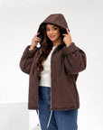 Lightweight hooded jacket made from polyester, suitable for winter and spring days, with soft and comfortable texture.