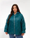 Lightweight hooded jacket made from polyester, suitable for autumn and winter walks, in a light colour.