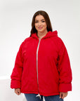 Lightweight hooded jacket made from polyester, image of a model, showing comfortable and stylish design for autumn and winter.