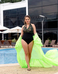 One-piece swimsuit от polyester, модел на бранд Composition, показан на модел в морска обстановка.