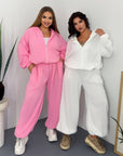 Hooded knit set made from cotton and polyester, with a stylish design and comfortable cut, suitable for everyday wear.