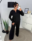 Soft button-up pyjamas made from viscose and polyester, comfortable for home comfort, shown in the image.